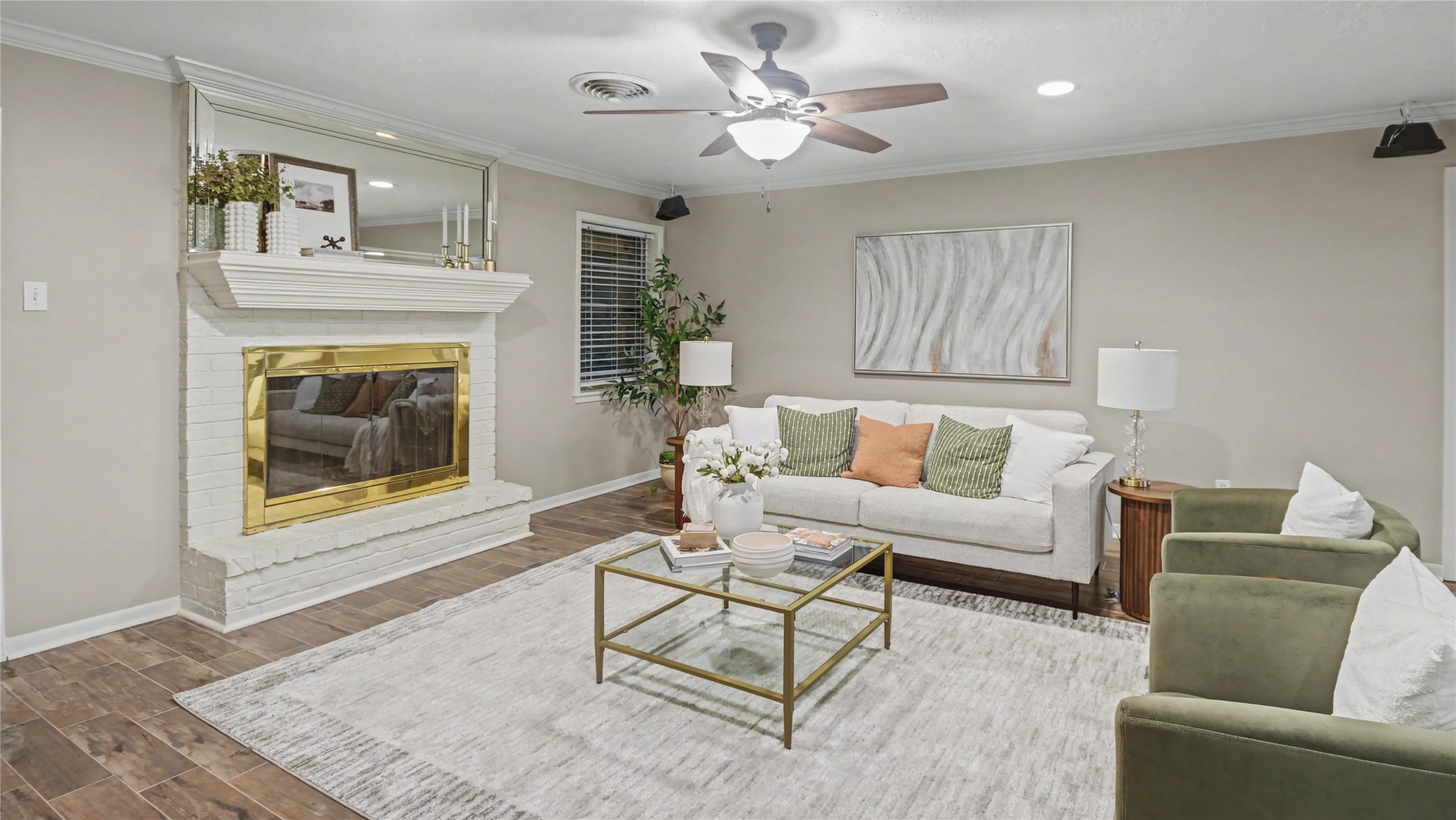 1431 Walnut Lane Houston, TX 77339 - Photo 8 of 44 Living space featuring a fireplace as the focal point, with a defined seating area that connects easily to the rest of the home.