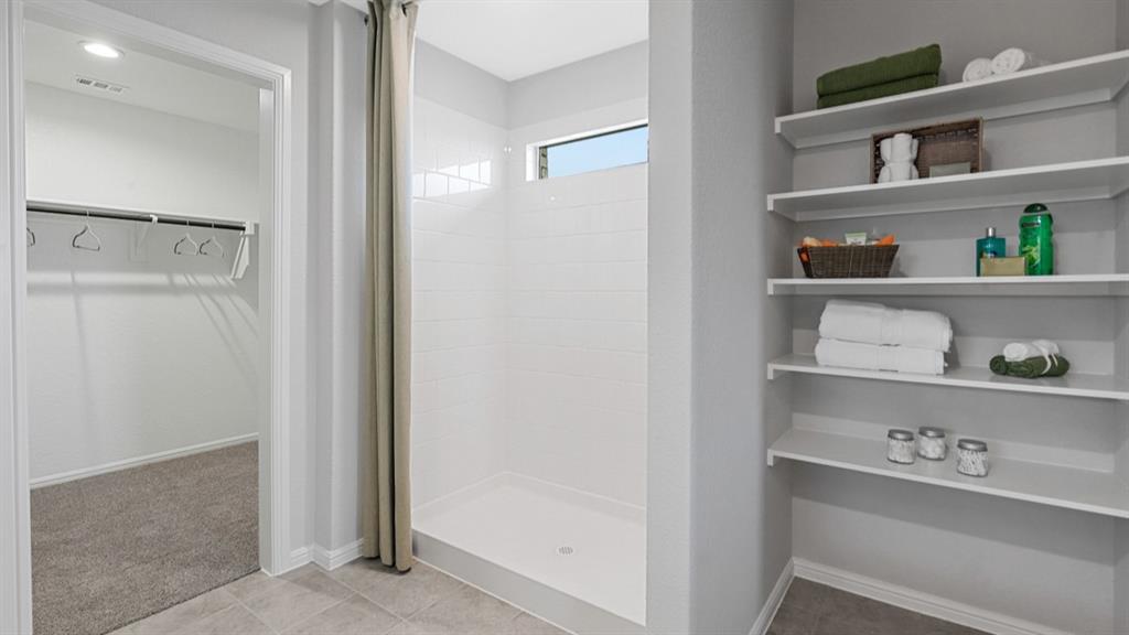 8509 Beltmill Parkway Fort Worth, TX 76131 - Photo 18 of 40 a view of white cabinets with wooden floor