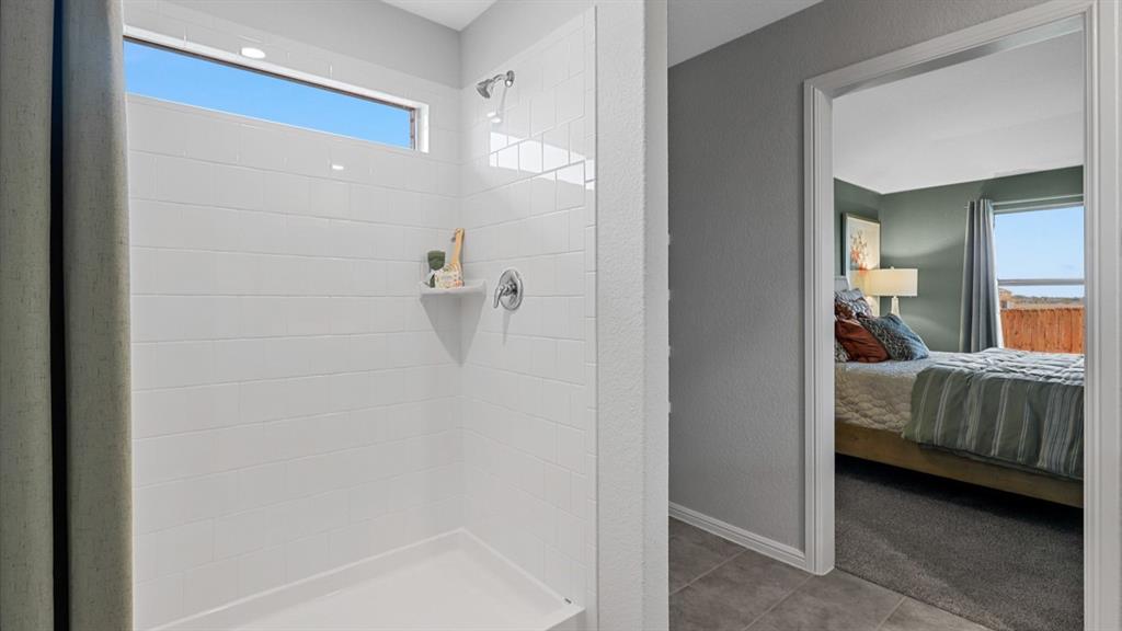 8509 Beltmill Parkway Fort Worth, TX 76131 - Photo 19 of 40 a en suite bathroom with a shower