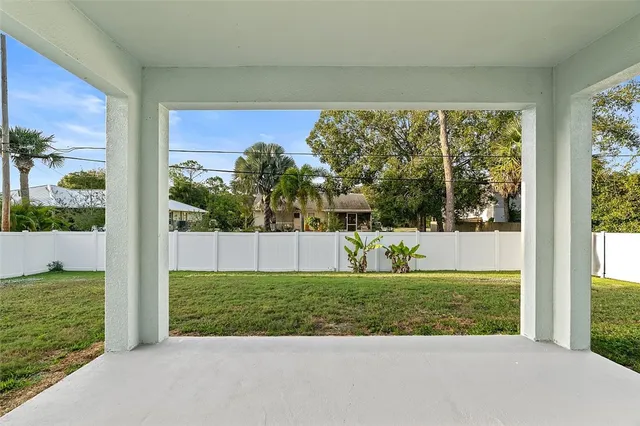 a view of a porch with a yard