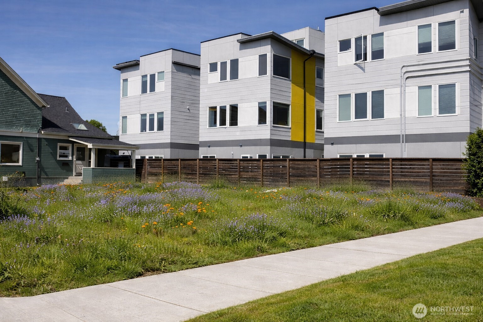 829 24th Avenue South, Unit PCL B Seattle, WA 98144 - Photo 1 of 3 a view of a big yard with plants and large trees