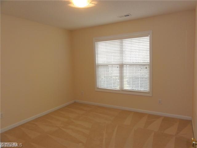 3810 Payne Road High Point, NC 27265 - Photo 13 of 16 3rd Bedroom. The third bedroom overlooks your private back yard!