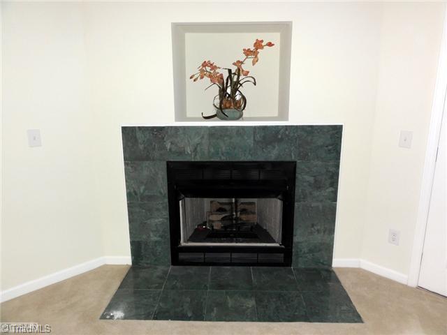 3810 Payne Road High Point, NC 27265 - Photo 4 of 16 Den/Family/Great Room. A closer look at the fireplace, complete with TV niche and gas logs!