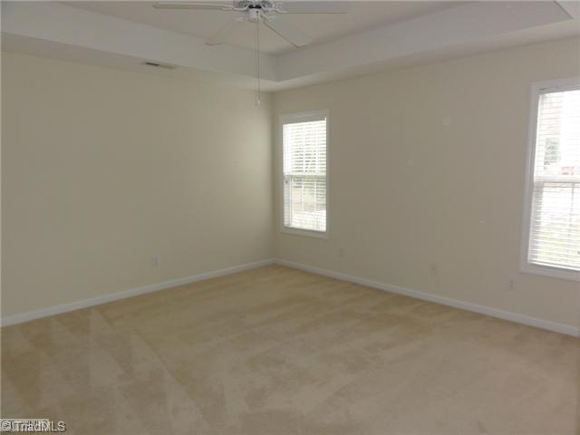 3810 Payne Road High Point, NC 27265 - Photo 8 of 16 Master Bedroom. The master bedroom features a tray ceiling and plenty of natural light!
