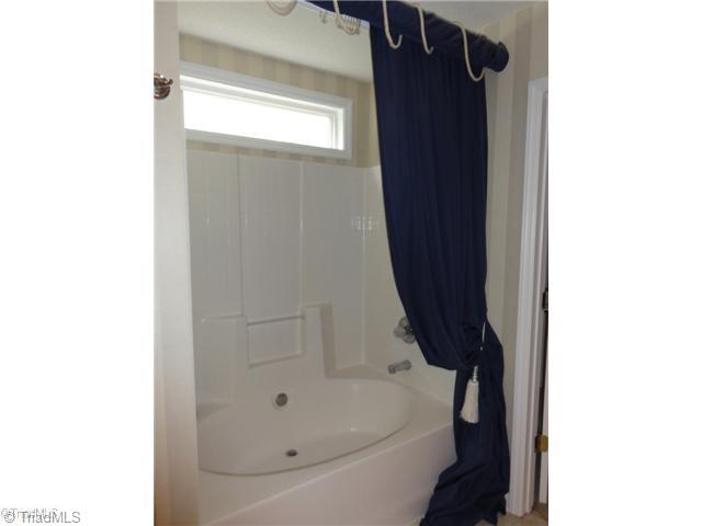 3810 Payne Road High Point, NC 27265 - Photo 10 of 16 Master Bath/Spa. Notice the transom window and garden tub... fabulous!