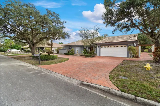 $929,000 | 9290 Northwest 14th Court, Coral Springs, FL 33071