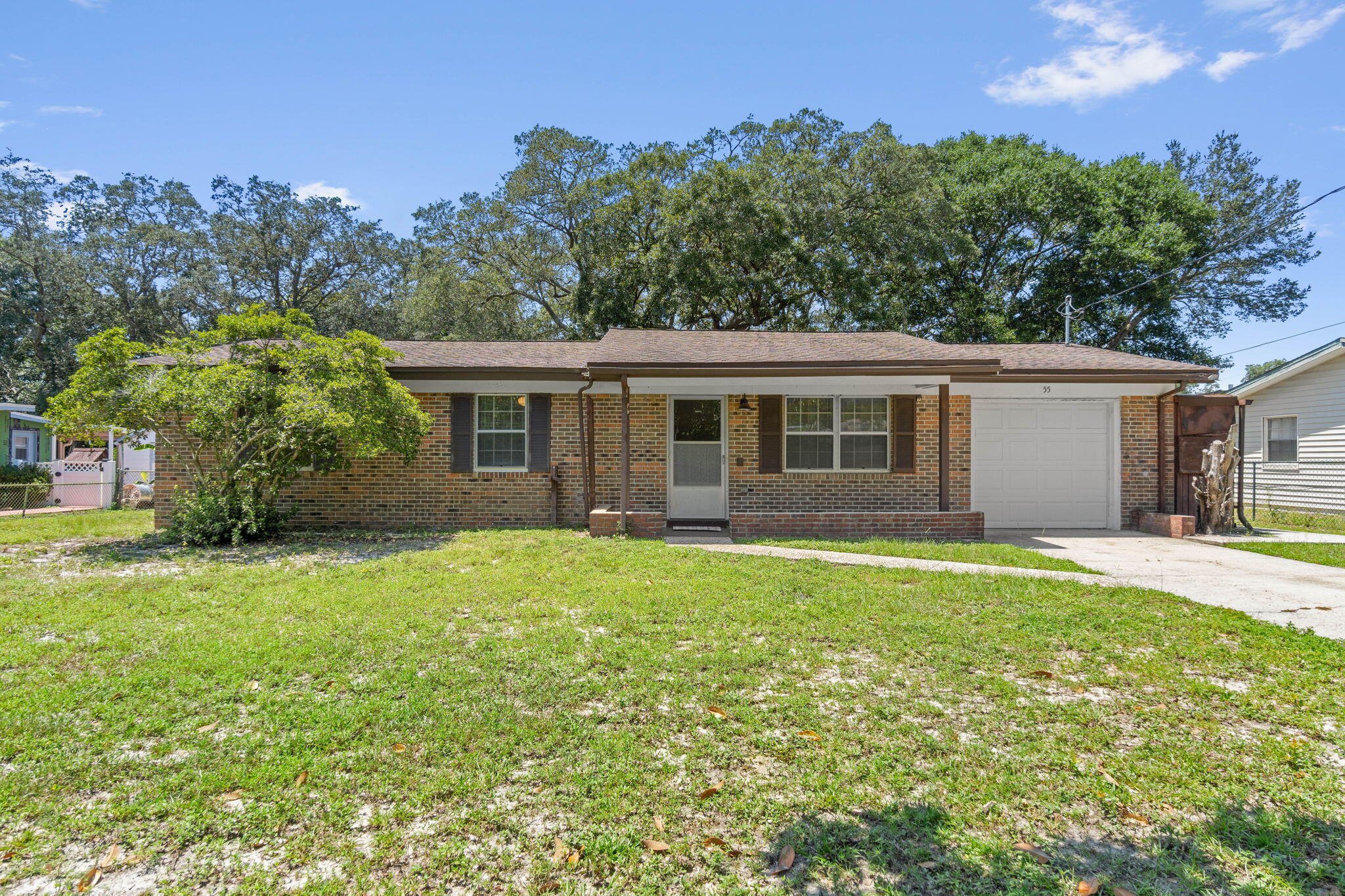 55 12th Street Shalimar, FL 32579 - Photo 2 of 22 front view of a house with a yard