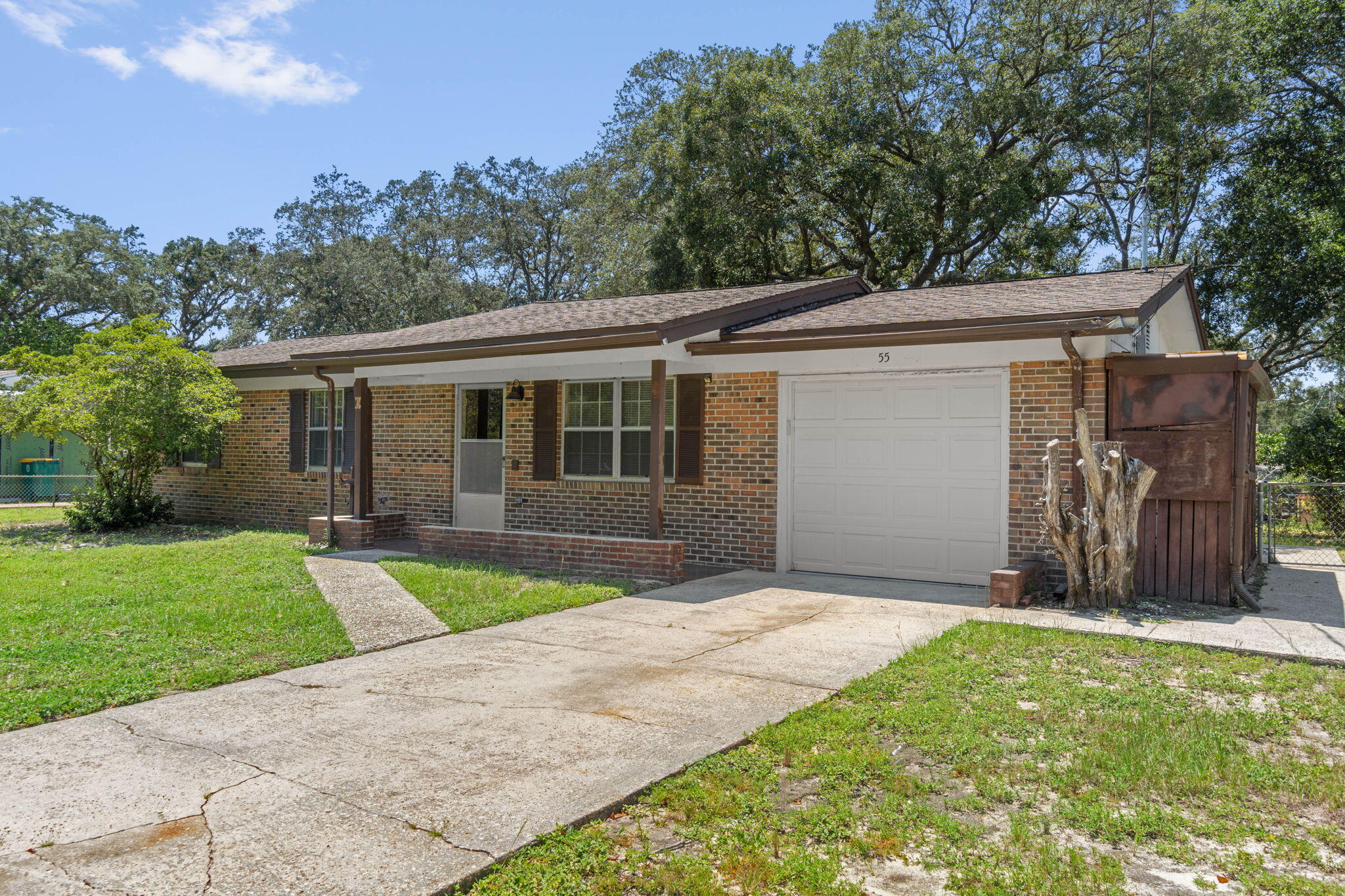 55 12th Street Shalimar, FL 32579 - Photo 3 of 22 front view of a house with a yard