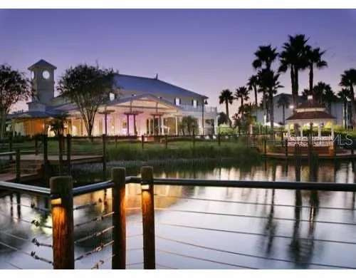 a view of a lake in front of the house