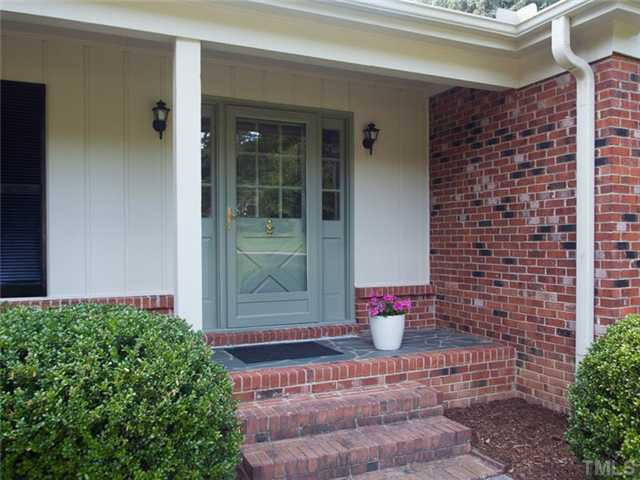 6109 Dodsworth Drive Raleigh, NC 27612 - Photo 2 of 21 Warm and inviting front door with slate porch.
