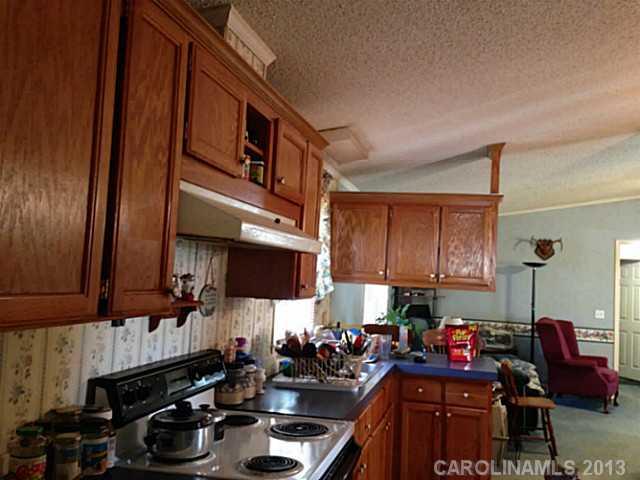 3400 Holden Road Lancaster, SC 29720 - Photo 14 of 14 a kitchen with lots of counter top space and a window