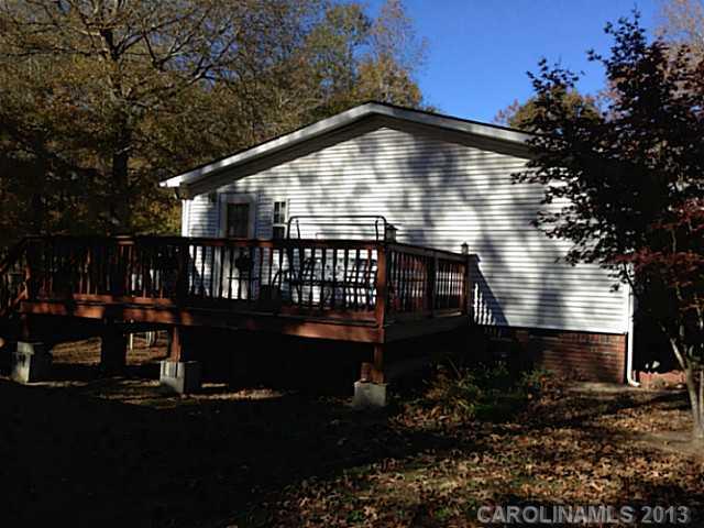 3400 Holden Road Lancaster, SC 29720 - Photo 3 of 14 a view of house with yard and sitting area