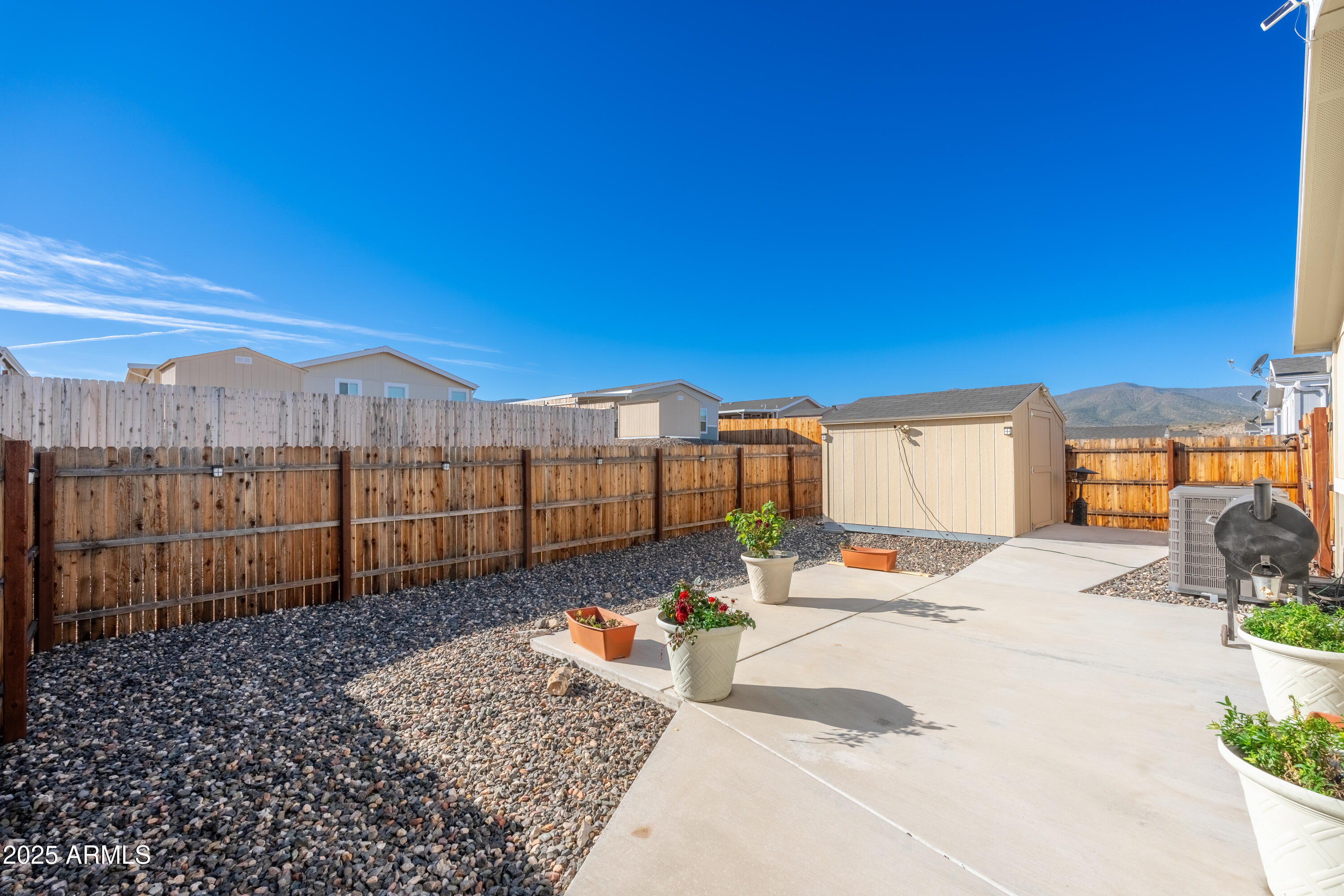 1033 Wheeler Road Camp Verde, AZ 86322 - Photo 31 of 51 a view of a backyard with sitting area