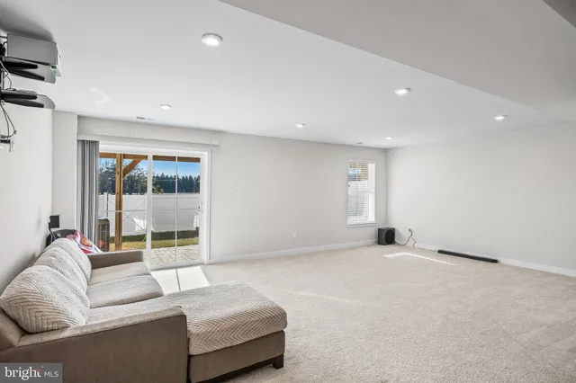 an empty room with a fireplace