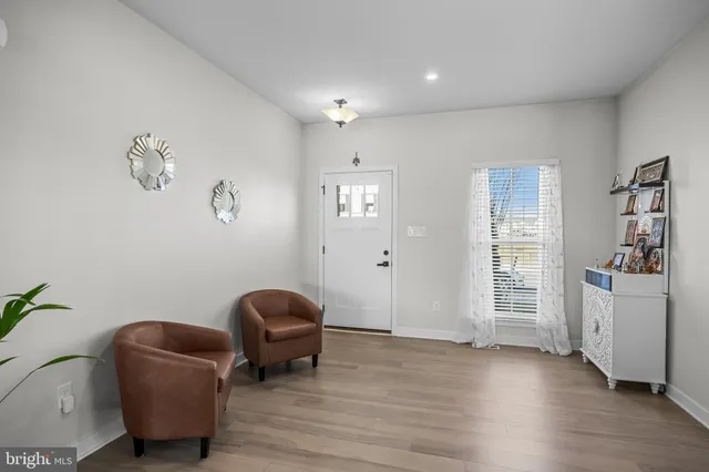 a living room with furniture and window