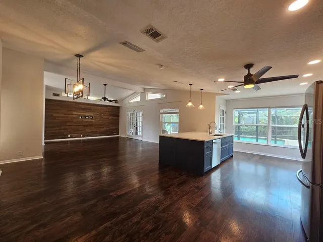 a view of a livingroom with wooden floor