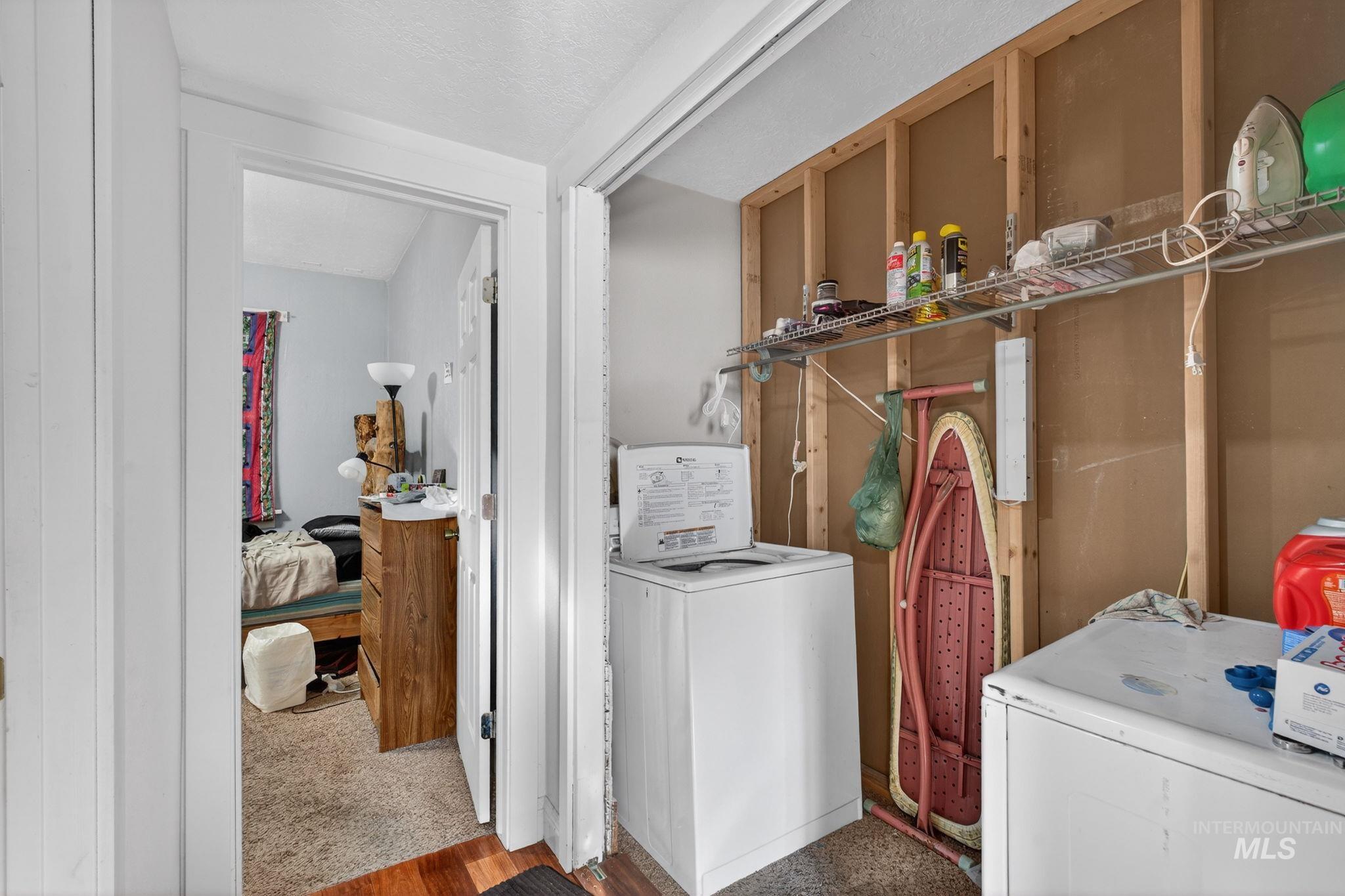 208 South 4th W Street Preston, ID 83263 - Photo 19 of 38 Laundry room featuring wood finished floors