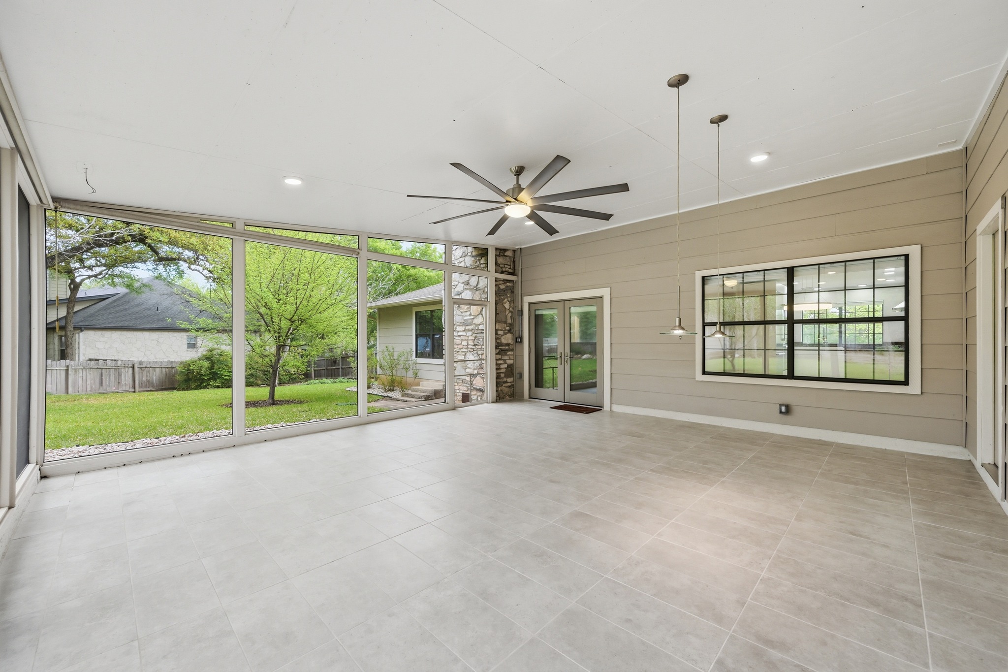 320 Ridgecrest Road Georgetown, TX 78628 - Photo 22 of 39 a view of an empty room with a window and a ceiling fan