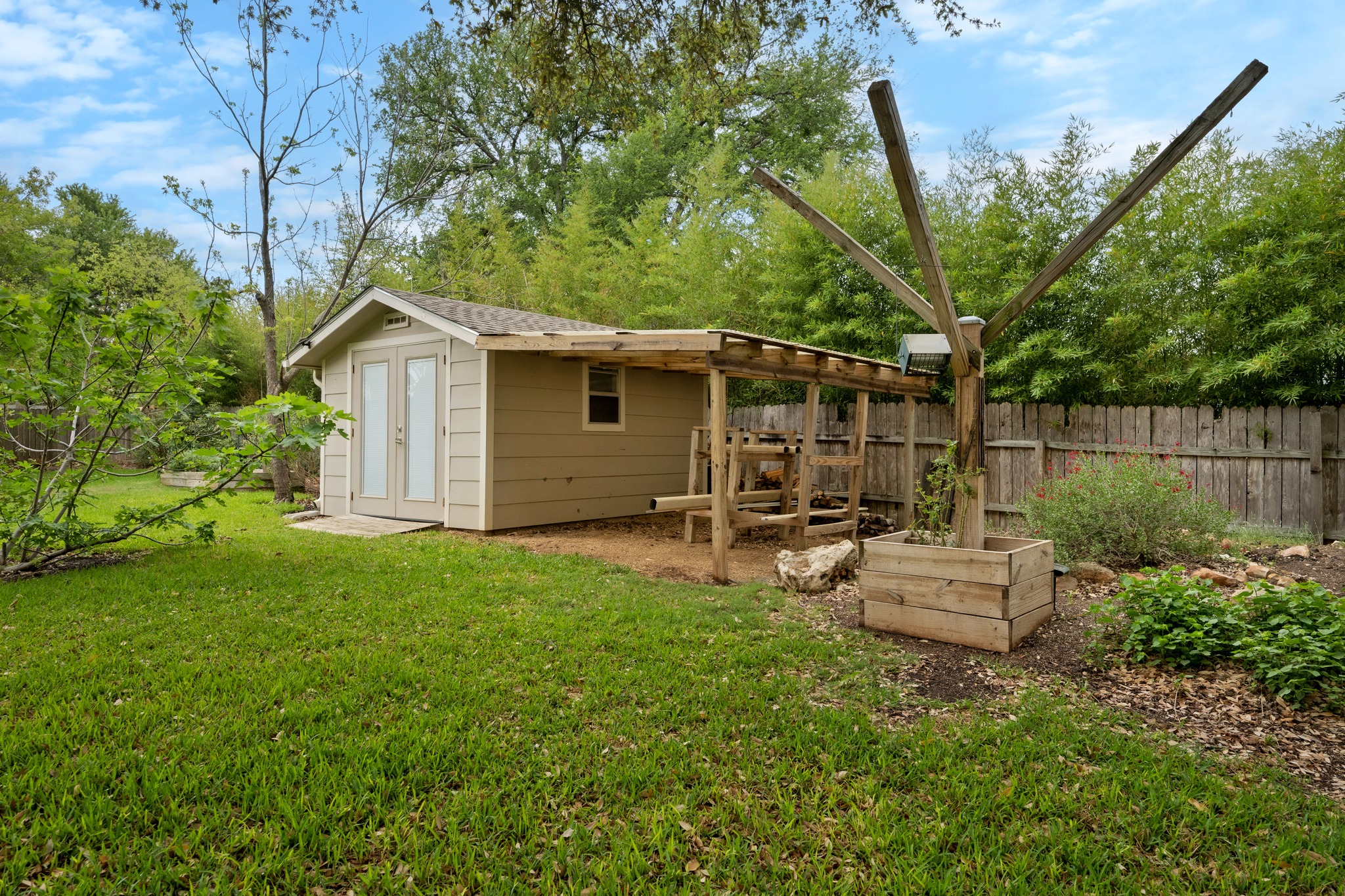 320 Ridgecrest Road Georgetown, TX 78628 - Photo 28 of 39 a view of backyard with seating space and trees