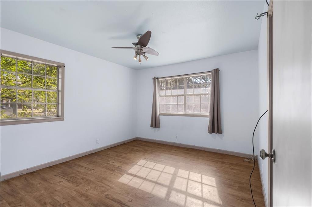 511 Happy Mount Mount Pleasant, TX 75455 - Photo 17 of 37 a view of an empty room with a window