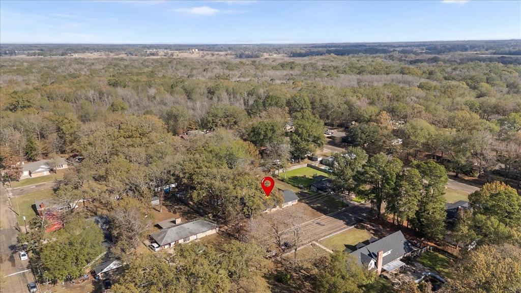 511 Happy Mount Mount Pleasant, TX 75455 - Photo 35 of 37 an aerial view of residential houses with outdoor space