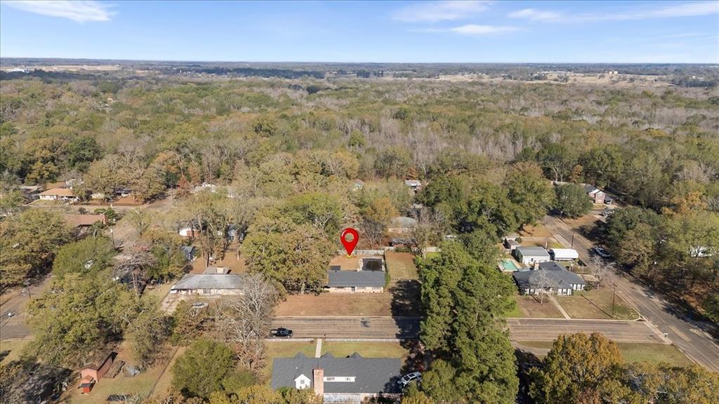 511 Happy Mount Mount Pleasant, TX 75455 - Photo 36 of 37 an aerial view of residential houses with outdoor space