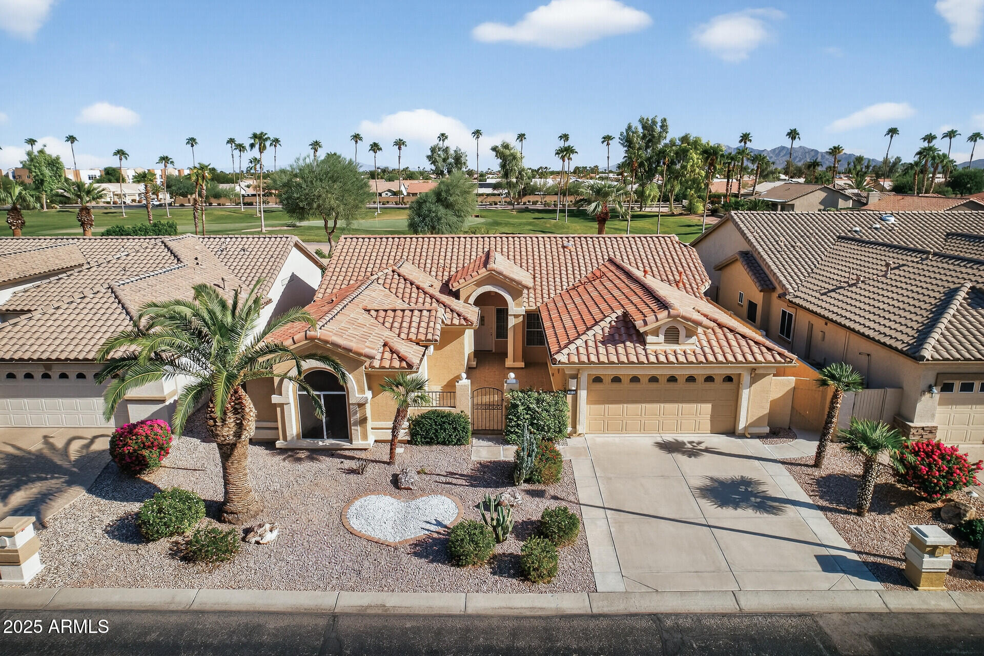 3533 North 159th Lane Goodyear, AZ 85395 - Photo 1 of 65 a view of swimming pool and outdoor seating