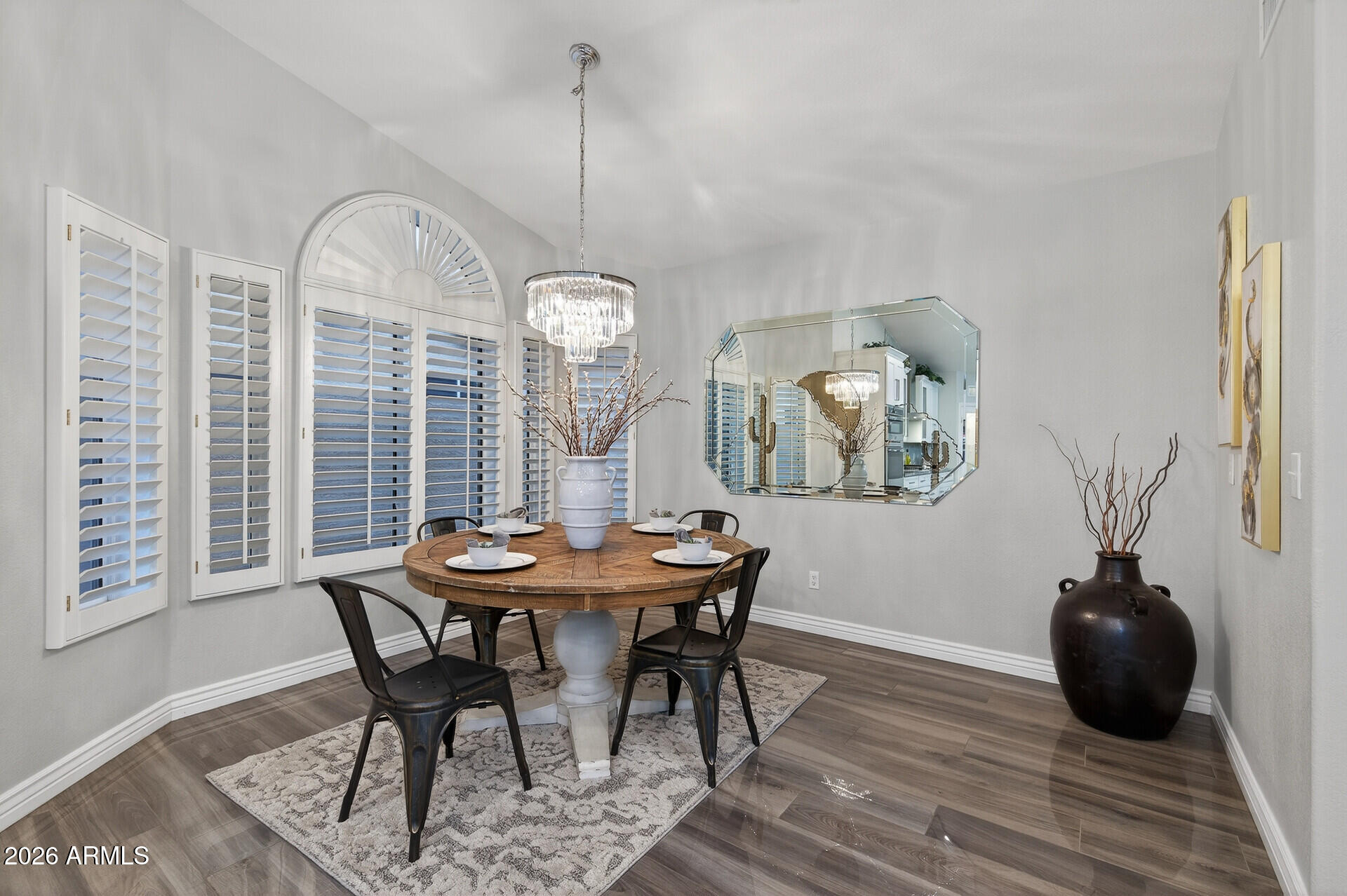 3533 North 159th Lane Goodyear, AZ 85395 - Photo 17 of 65 a view of a dining room with furniture and window