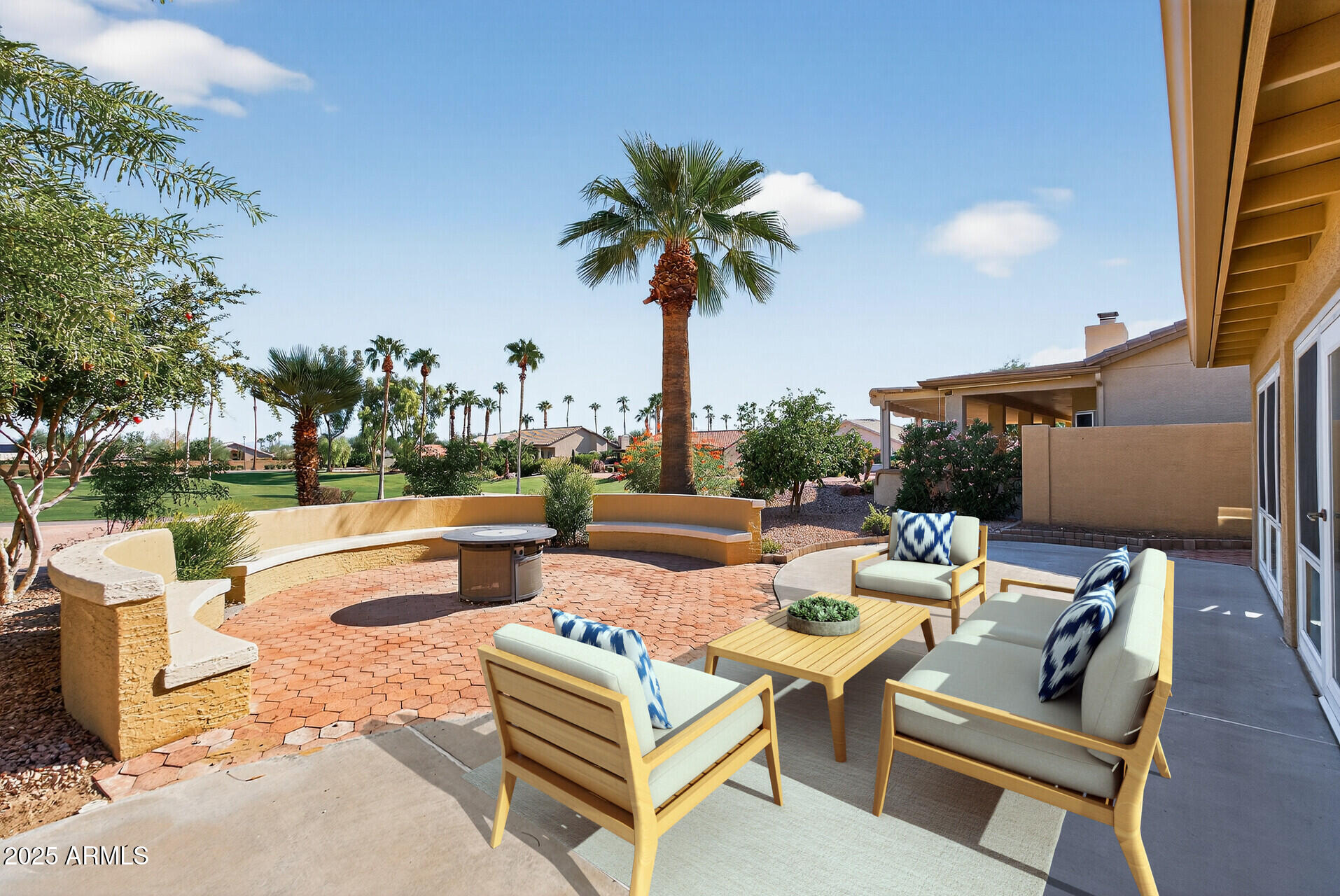 3533 North 159th Lane Goodyear, AZ 85395 - Photo 50 of 65 a picture of a table and chairs in the patio