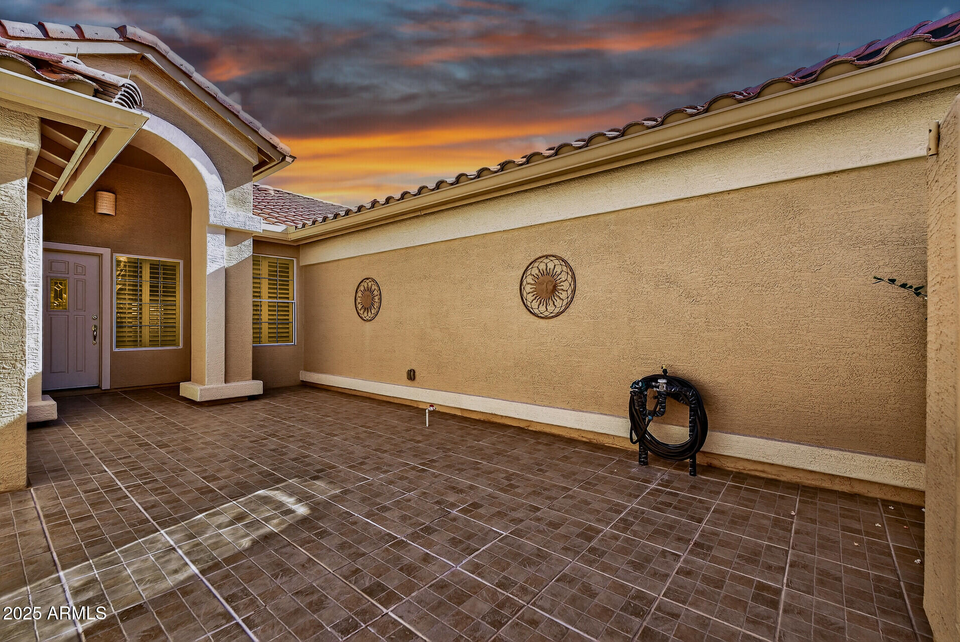 3533 North 159th Lane Goodyear, AZ 85395 - Photo 62 of 65 a view of a blue house with a outdoor space