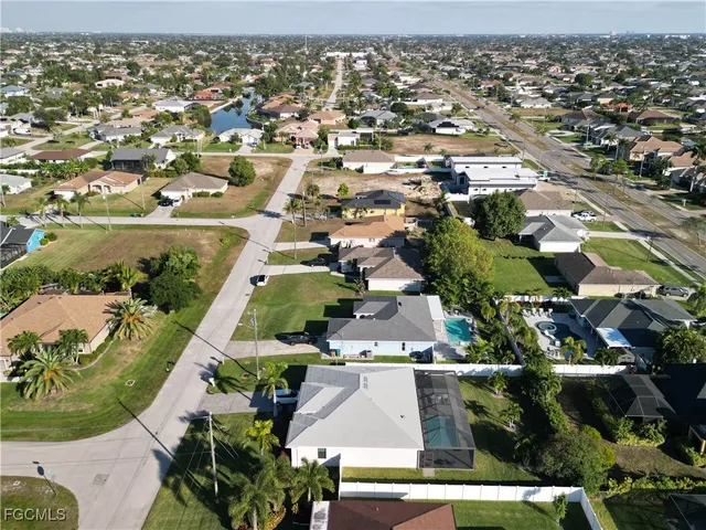 a aerial view of a house with outdoor space