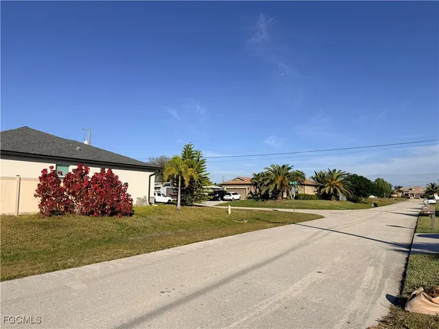 a view of a street with houses