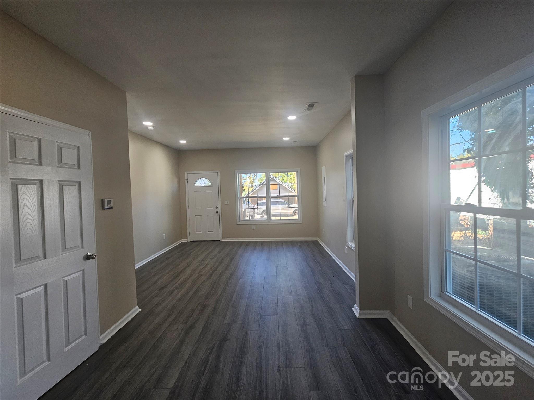 106 Steinkuhler Street, Unit 6 Chester, SC 29706 - Photo 24 of 25 wooden floor in an empty room with a window