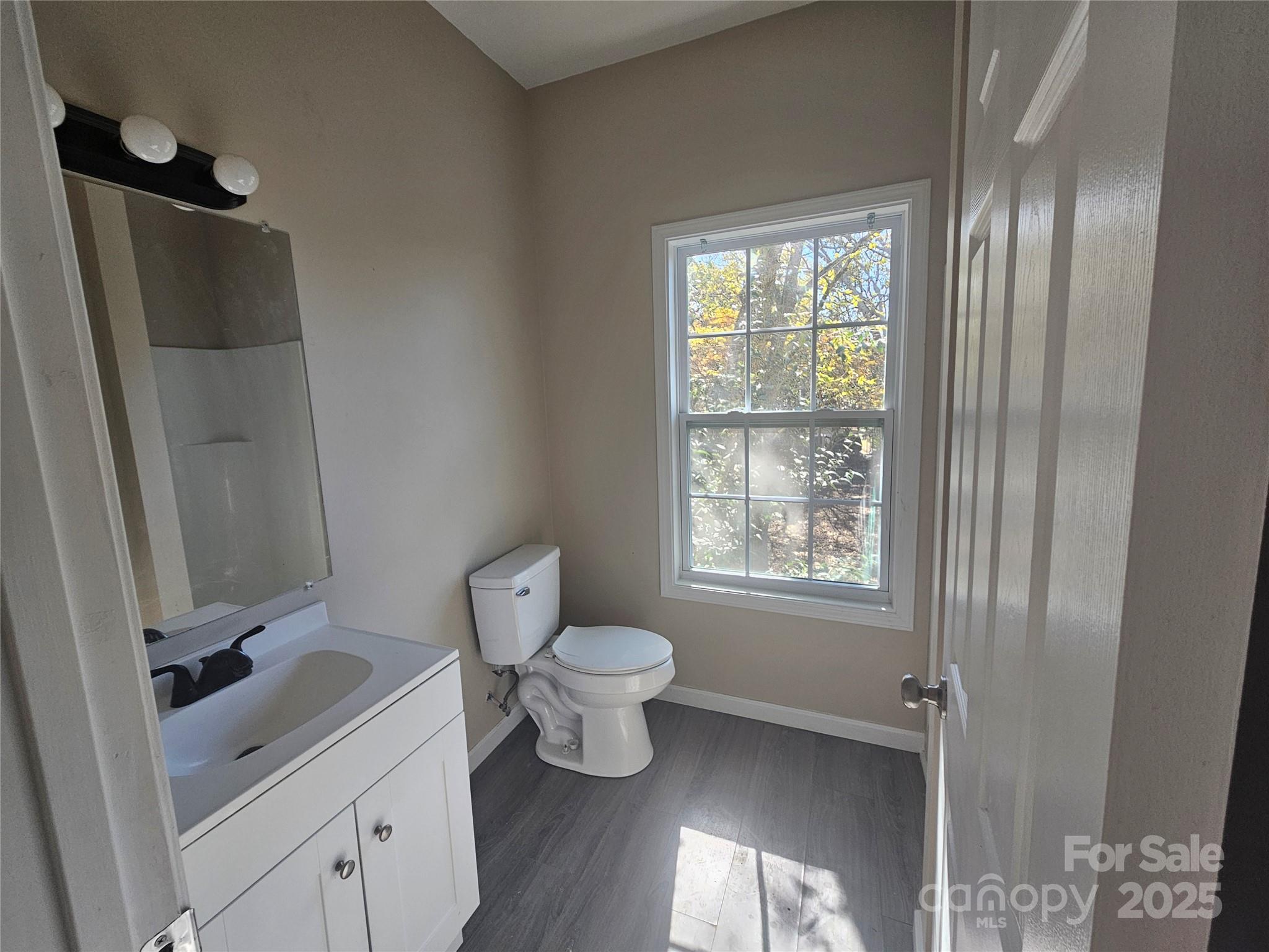 106 Steinkuhler Street, Unit 6 Chester, SC 29706 - Photo 8 of 25 a bathroom with a toilet sink and tub