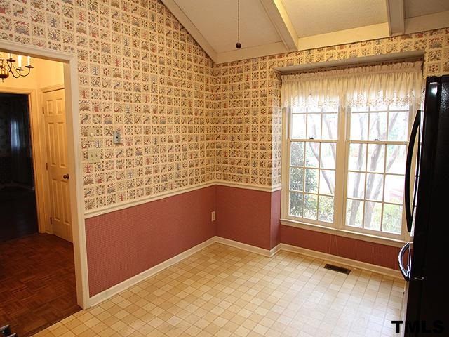 1213 Oakside Court Raleigh, NC 27609 - Photo 6 of 13 view of an empty room with a window