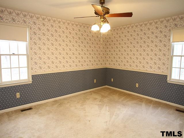 1213 Oakside Court Raleigh, NC 27609 - Photo 9 of 13 en empty room with window