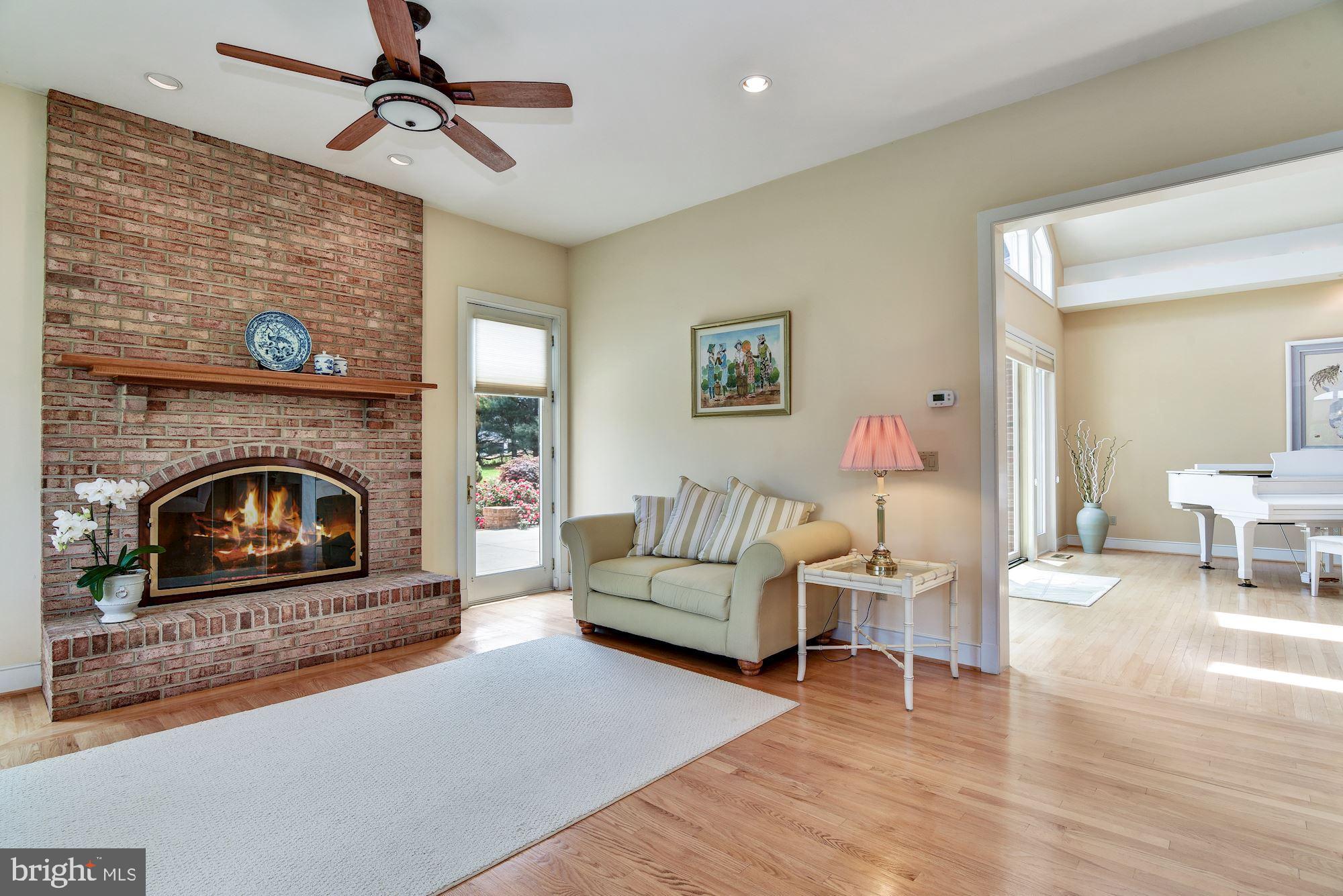 13047 Hall Shop Road Highland, MD 20777 - Photo 22 of 58 Den & Fireplace Sided By Atrium to Pool &Patio