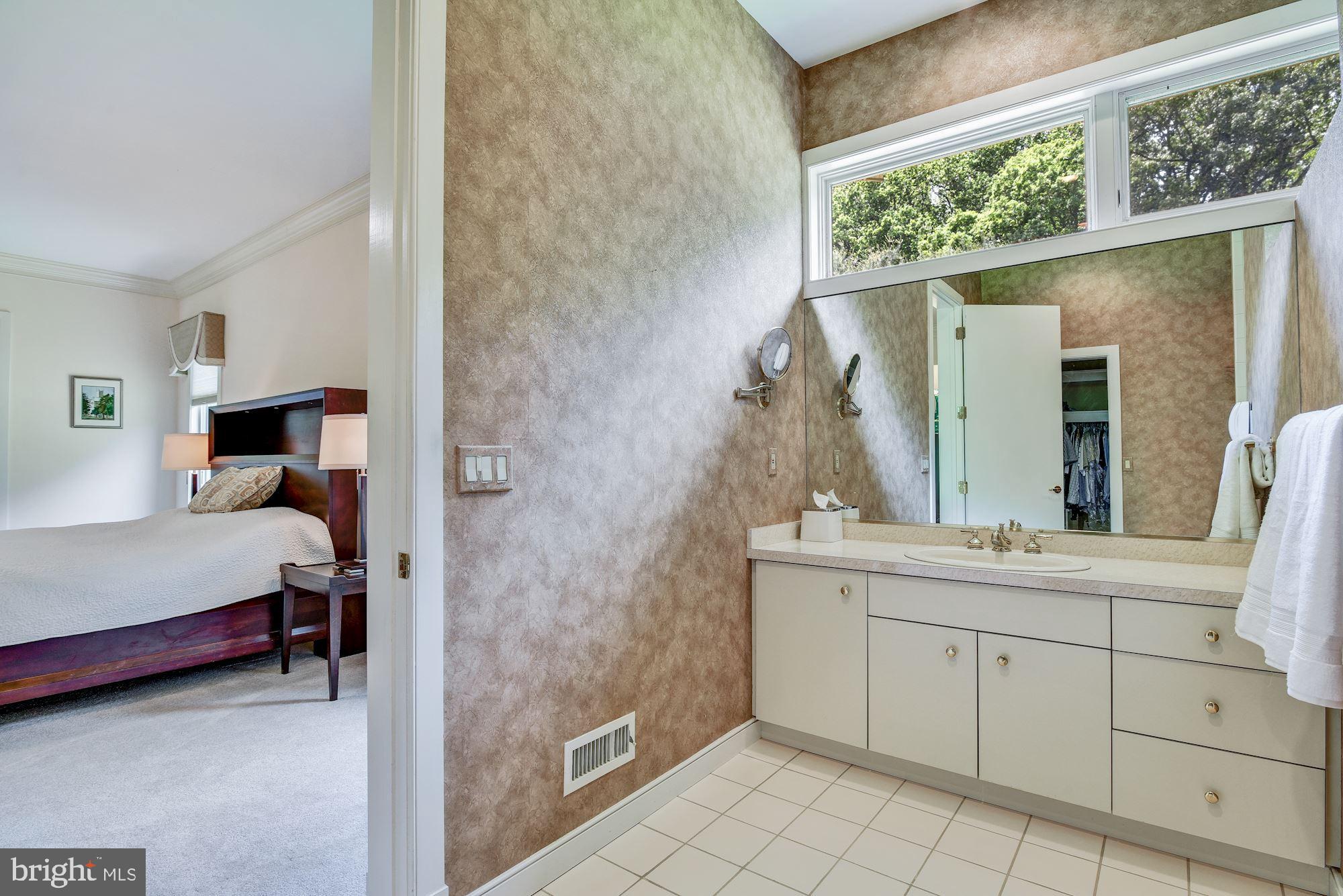 13047 Hall Shop Road Highland, MD 20777 - Photo 33 of 58 His / Partner Bath & Clerestory Window