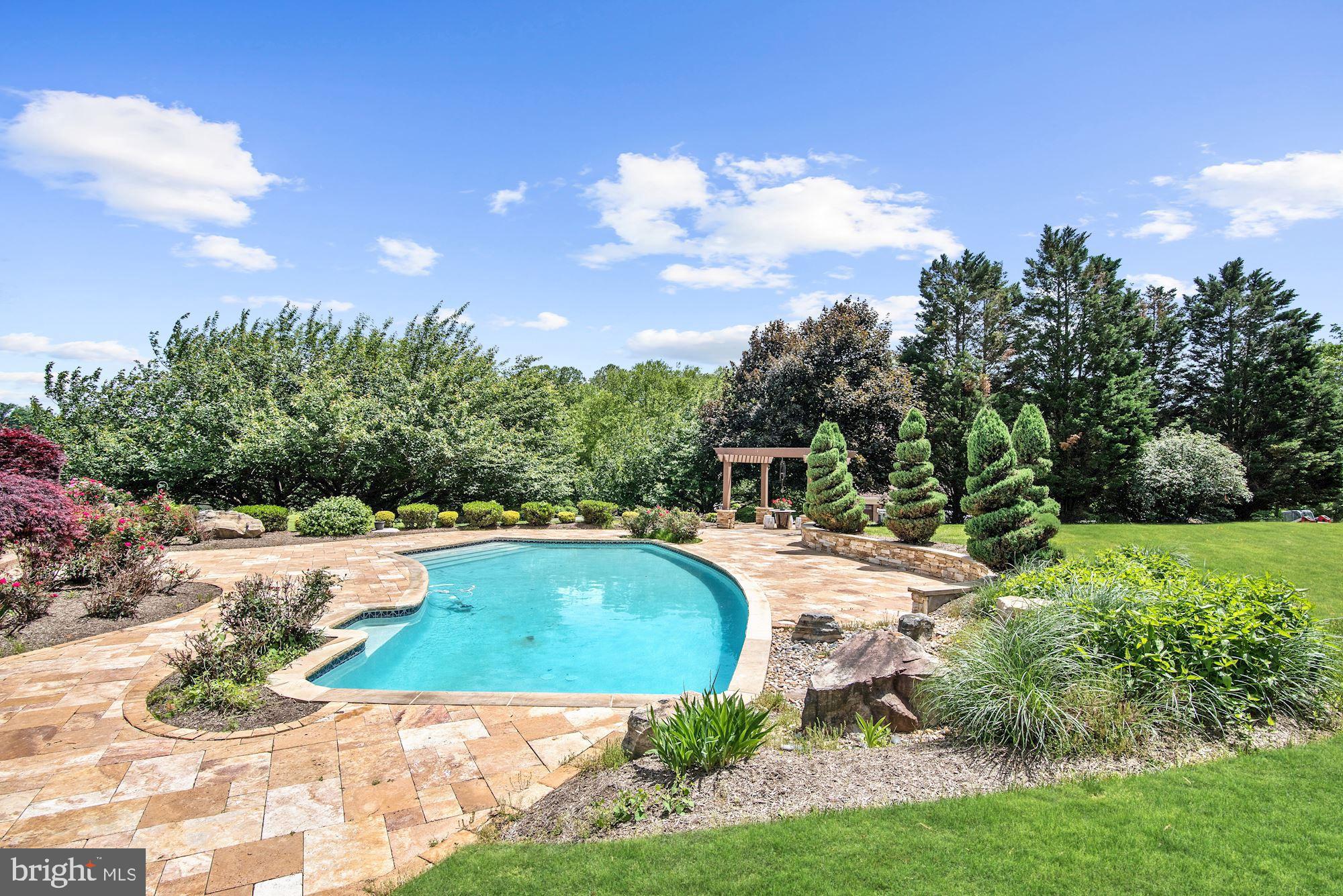 13047 Hall Shop Road Highland, MD 20777 - Photo 43 of 58 Professional Landscaping & Hardscaping Around Pool