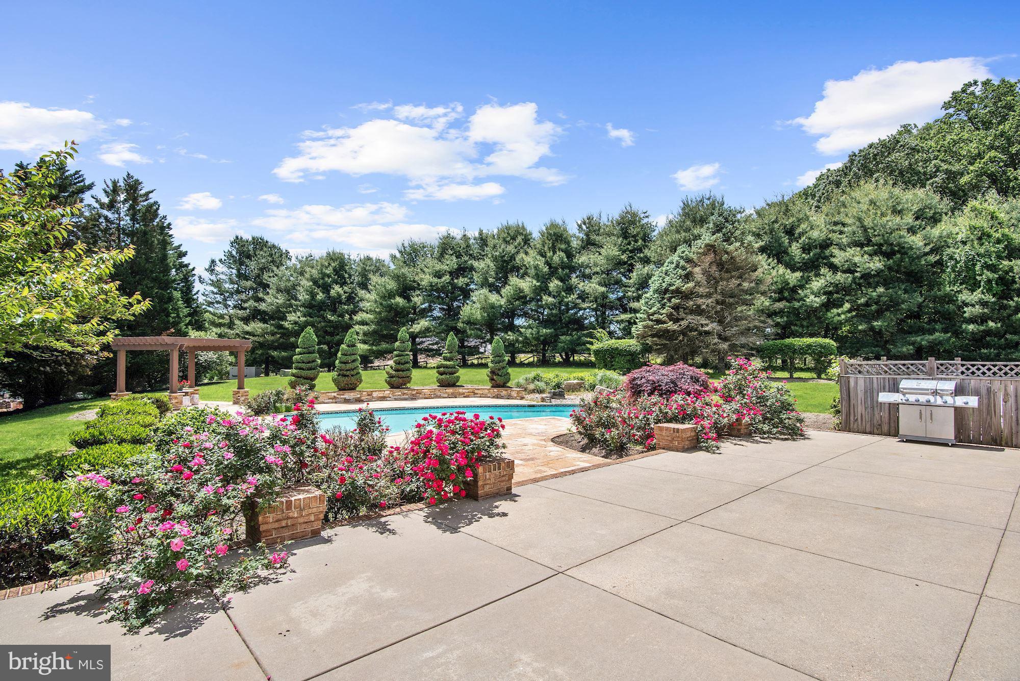 13047 Hall Shop Road Highland, MD 20777 - Photo 44 of 58 Tree- Fringed Rear Lawn, Patio, and Gardens