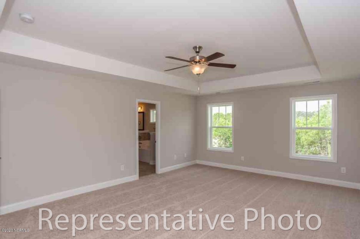 112 Violetear Ridge, Unit 49 Hampstead, NC 28443 - Photo 6 of 14 025_Master Bedroom_compressed_compressed