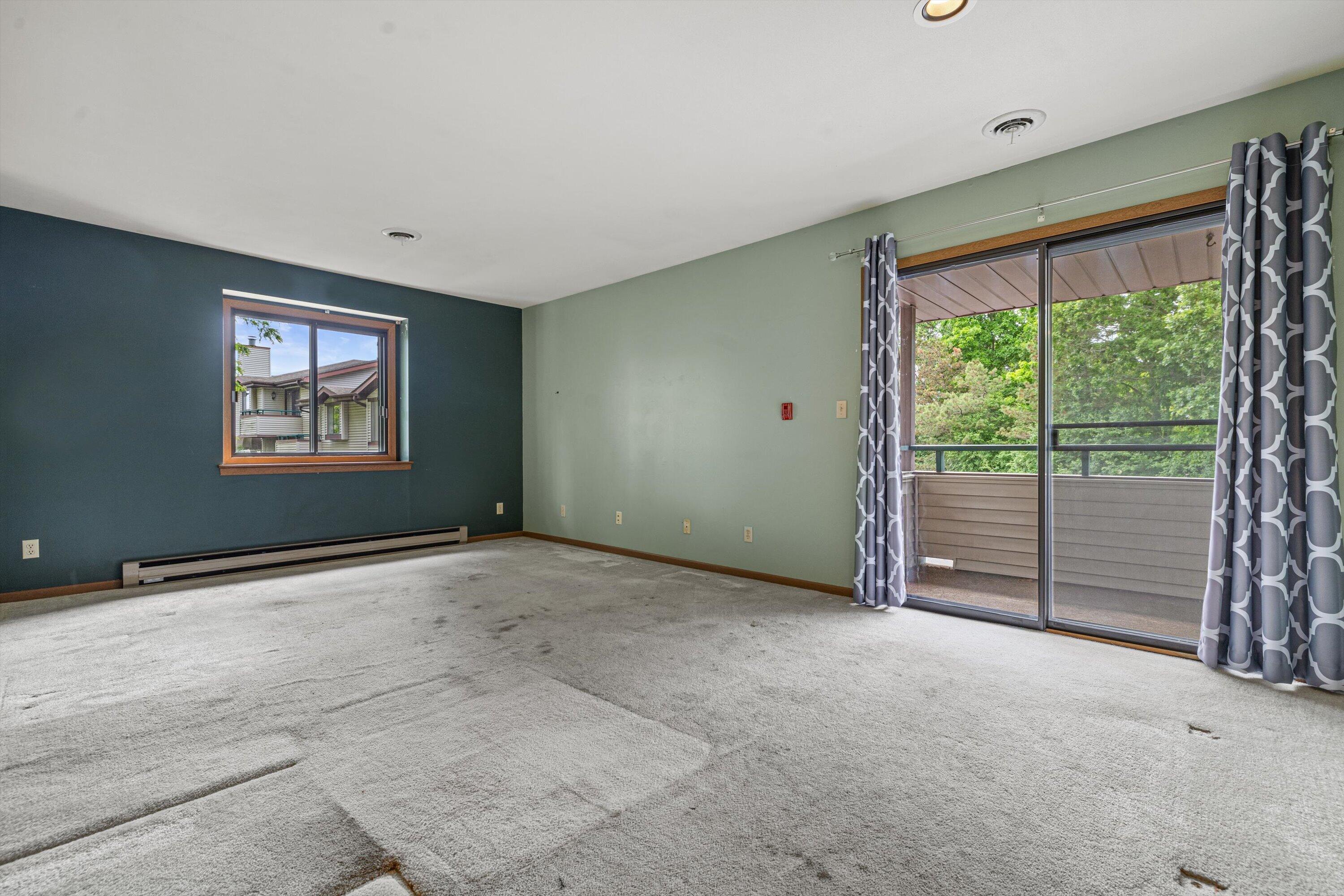 3220 Wood Road, Unit 10 Mount Pleasant, WI 53406 - Photo 6 of 22 Great Room Patio door to balcony