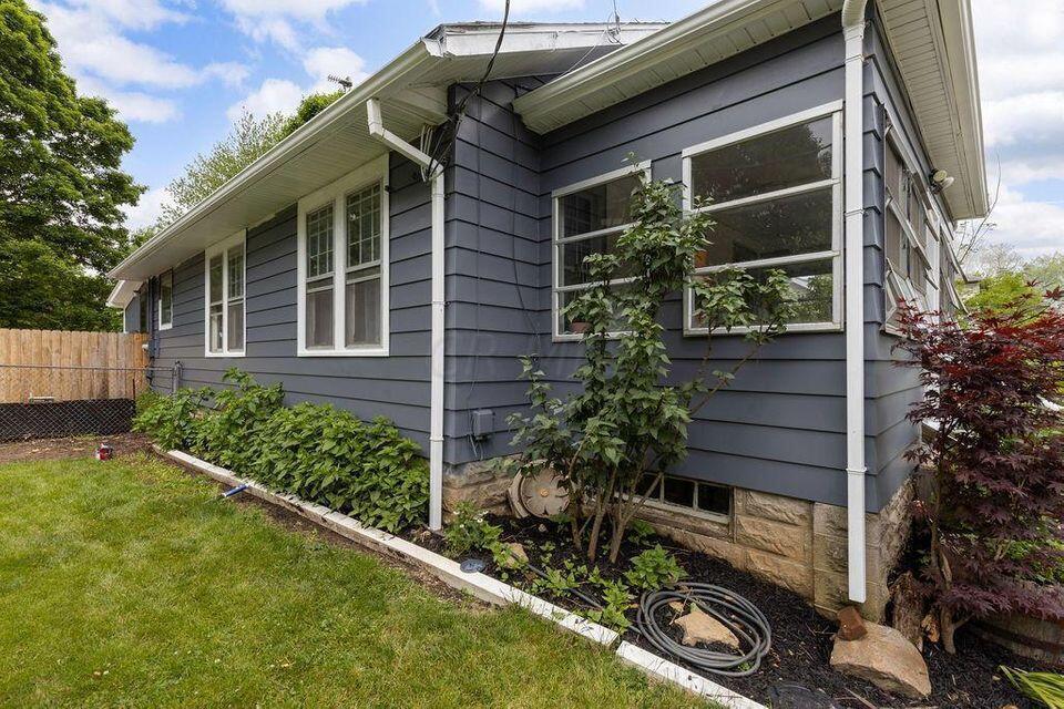 4085 North Old State Road Delaware, OH 43015 - Photo 26 of 34 Side Lush Flowerbeds