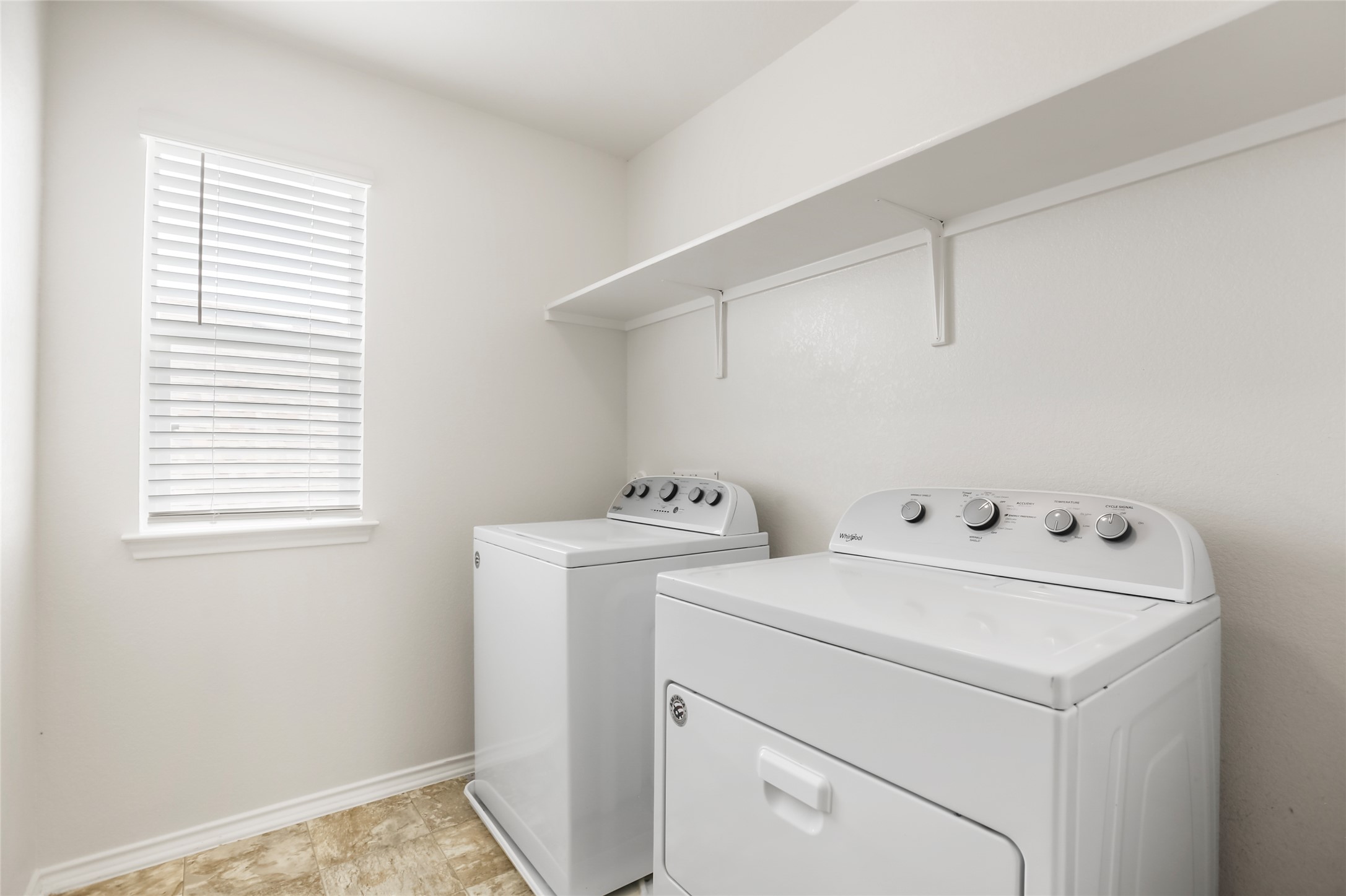 18917 Rushmore Street Manor, TX 78653 - Photo 20 of 28 a utility room with dryer and washer