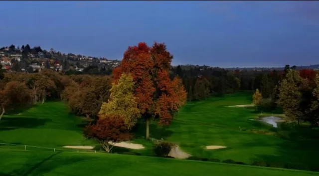a view of a golf course with a garden