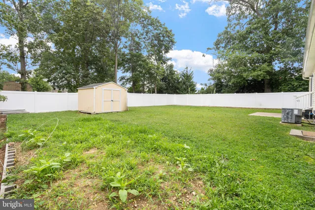 a view of a mini pool with an outdoor space and seating area