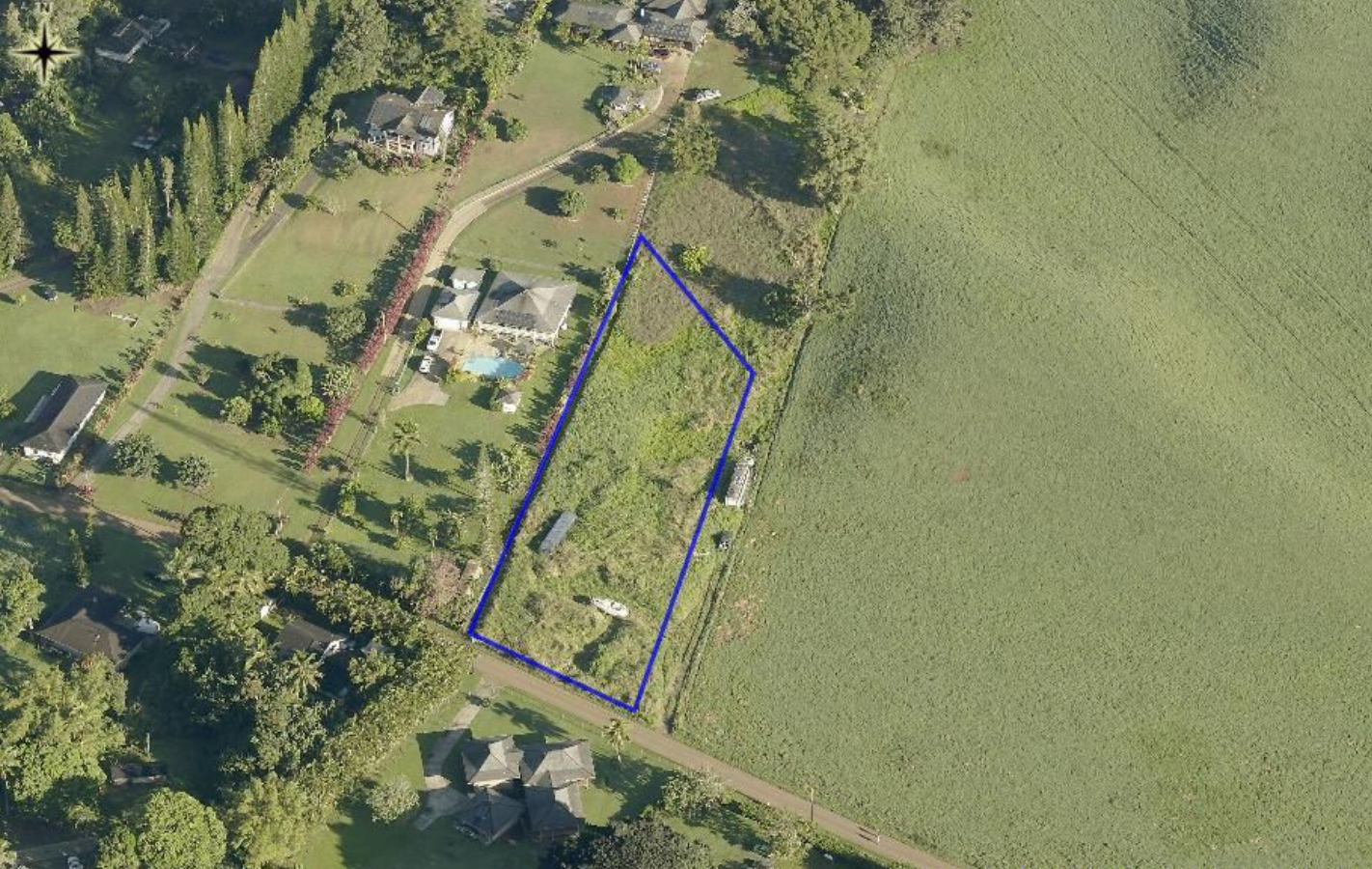 1 Kipapa Road Kapaa, HI 96746 - Photo 2 of 7 a picture of door with small garden