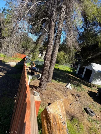 a view of a backyard of the house