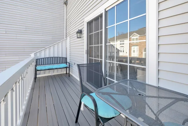 a view of a balcony with chair