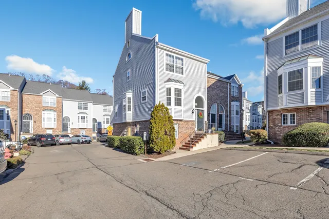 a view of a street with cars